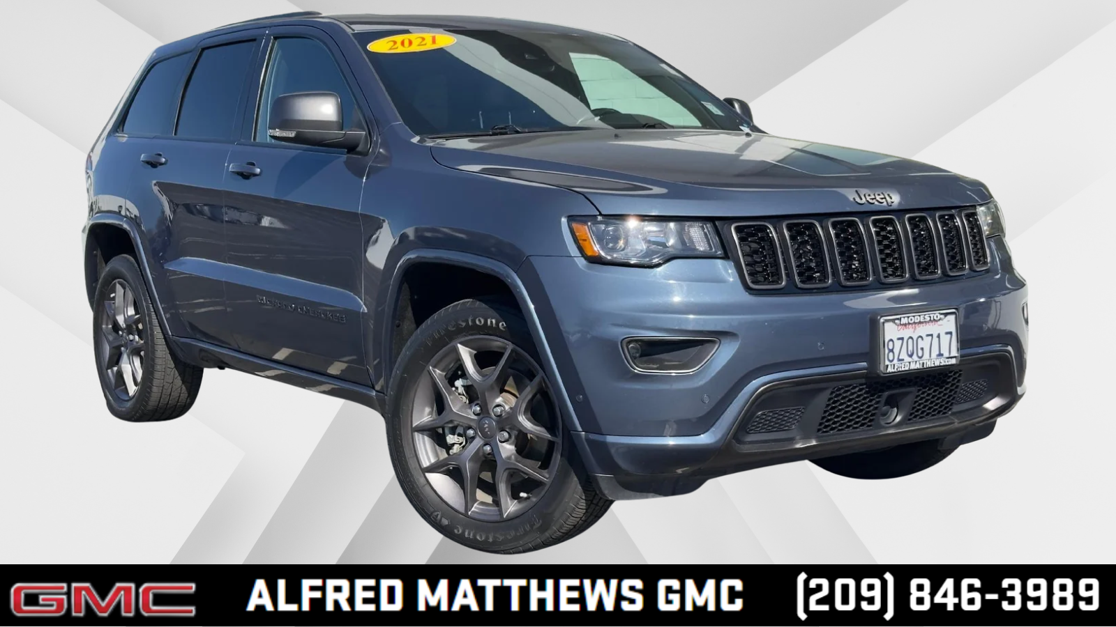 2021 Jeep Grand Cherokee 80th Anniversary in Blue — front three-quarter view