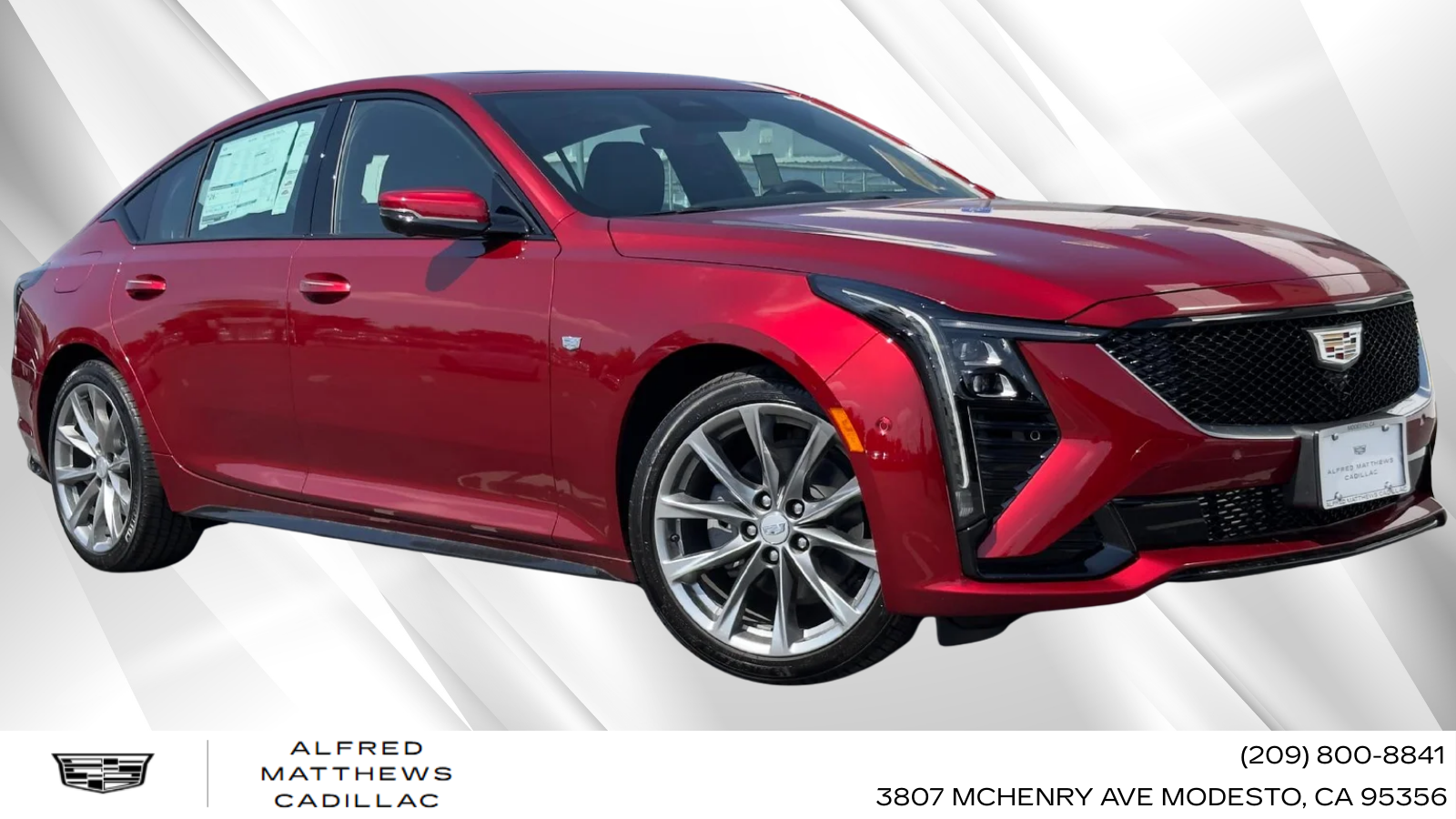 2026 Cadillac CT5 Sport in Radiant Red Tintcoat — front three-quarter view