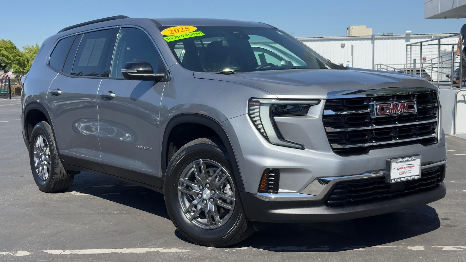 2025 GMC Acadia Elevation in Sterling Metallic — front three-quarter view