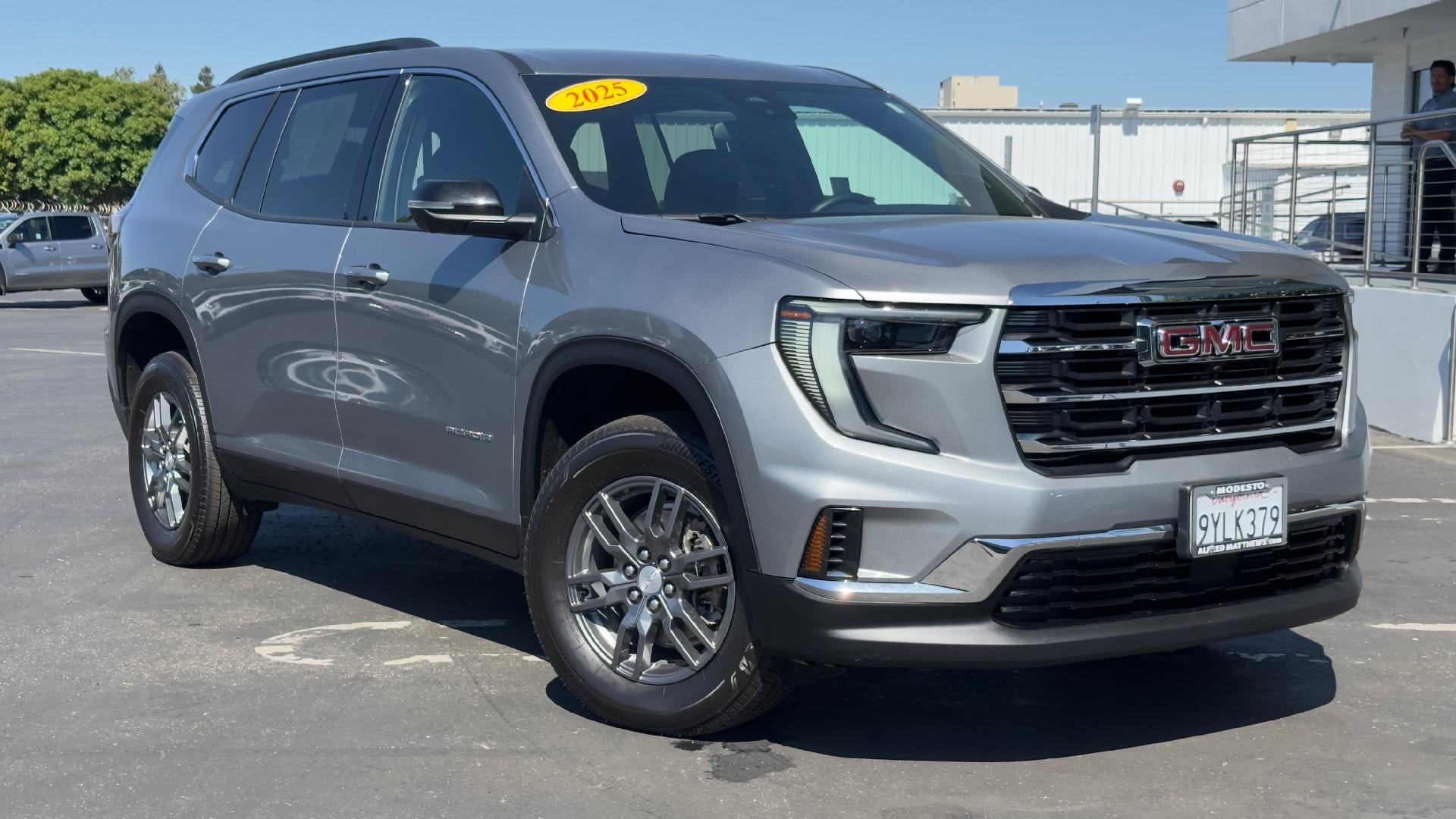 2025 GMC Acadia Elevation in Sterling Metallic — front three-quarter view