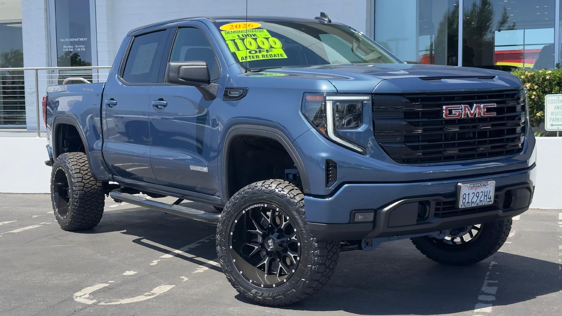 2026 GMC Sierra 1500 Elevation in Downpour Metallic — front three-quarter view